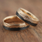 Preview: Eheringe aus 585 Apricotgold und Carbon