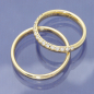 Preview: Eheringe aus 585 Apricotgold mit 0,225 ct G/Si Brillanten