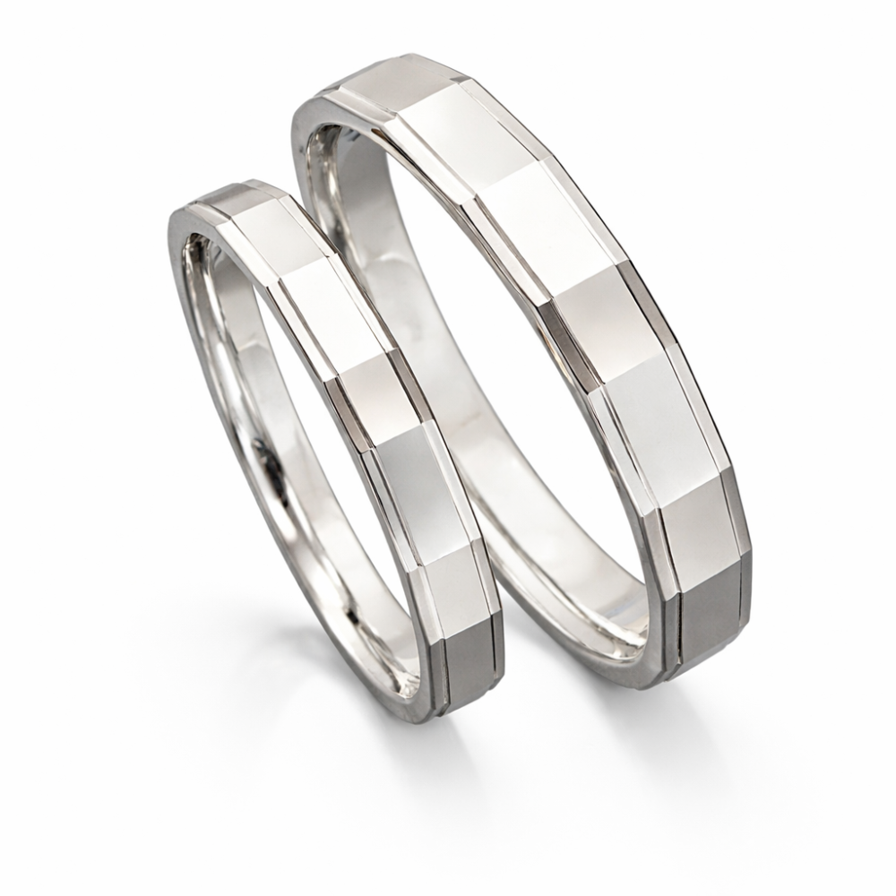 Preview: Twinkles Trauringe aus 375 Weißgold – facettenreiche Eleganz in moderner Form