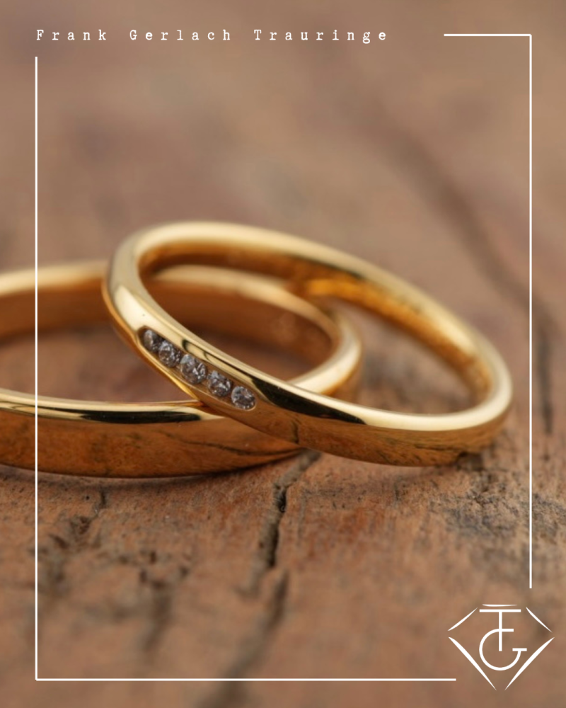 Preview: Zeitlose Eleganz: Schmale Gelbgold Eheringe mit funkelnden Brillanten