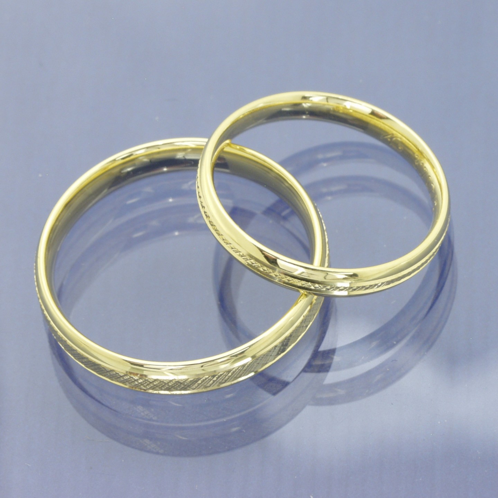 Preview: Twinkles Trauringe aus 375 Gelbgold – moderne Leichtigkeit mit funkelnden Details