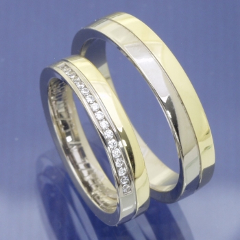 Dualer Glanz: MEMOIRE & TRAURING Bicolor-Ringe aus 585 Gelb- und Weißgold mit Brillantbesatz