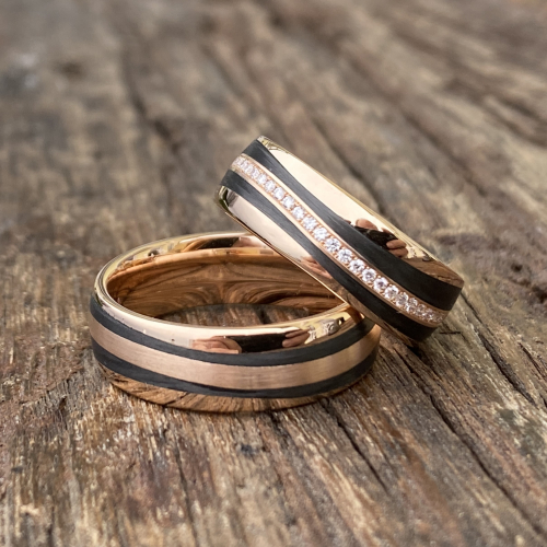 Eheringe Rotgold und Carbon Welle und Brillantkranz